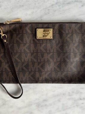 Michael Kors Dark Brown Monogram Signature Wristlet with Gold Plate